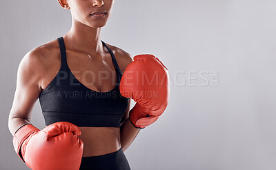 Buy stock photo Boxing, gloves and woman on background, mockup and space for sports exercise, strong warrior and mma training. Female boxer, workout and fist fight in studio, energy and power in challenge of mock up