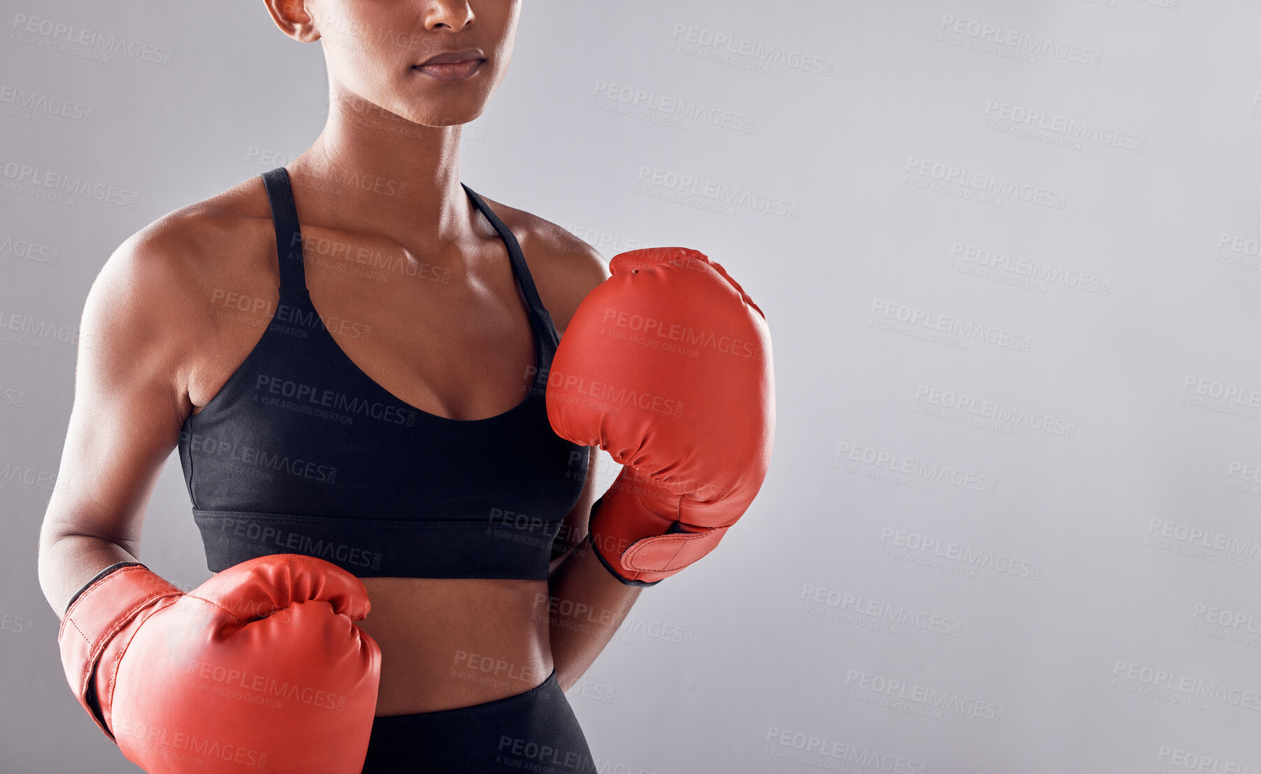 Buy stock photo Boxing, gloves and woman on background, mockup and space for sports exercise, strong warrior and mma training. Female boxer, workout and fist fight in studio, energy and power in challenge of mock up