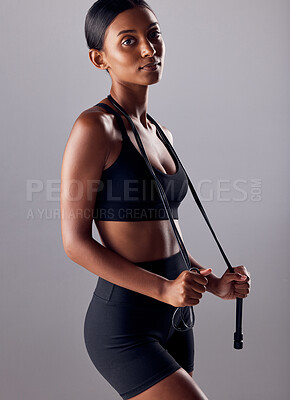 Buy stock photo Fitness, jump rope and health with portrait of Indian woman for skipping, workout and cardio training. Strong, wellness and exercise with face of girl athlete for sports, motivation and gym goals 