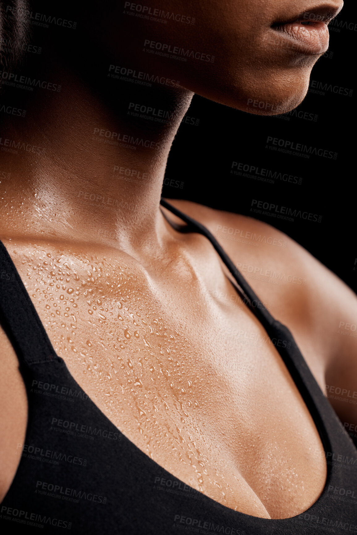 Buy stock photo Fitness, sweat and chest of a woman in a studio after an intense workout or sport training. Sports, health and healthy female athlete sweating after a health gym exercise by a black background.