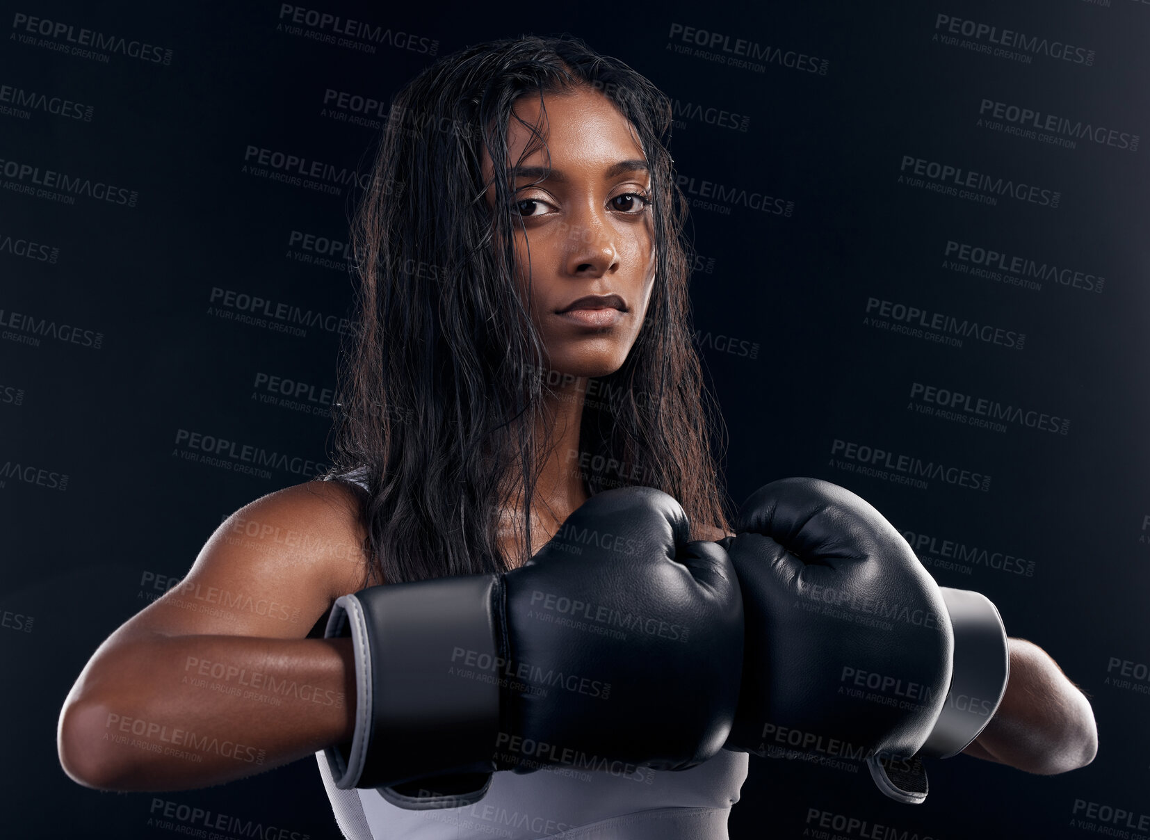 Buy stock photo Portrait, woman and boxer with fitness, serious and ready for match, confident and dark studio background. Face, female athlete and lady with gloves, training or endurance for energy, strong or power