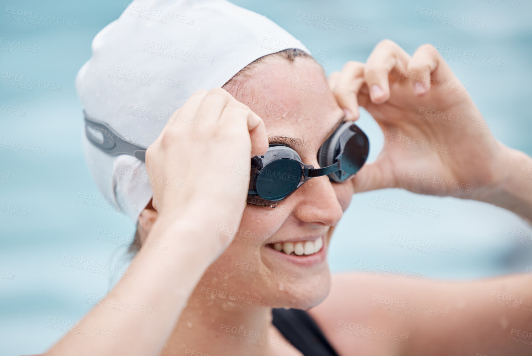 Buy stock photo Training, sports or happy woman in swimming pool or water for practice, workout or body fitness. Wellness, smile or healthy girl athlete in goggles exercising for cardio, endurance or exercise goals