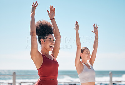 Buy stock photo Yoga, chakra and beach with woman friends outdoor together in nature for wellness training. Exercise, fitness or zen with a female yogi and friend outside for a mental health workout by the ocean