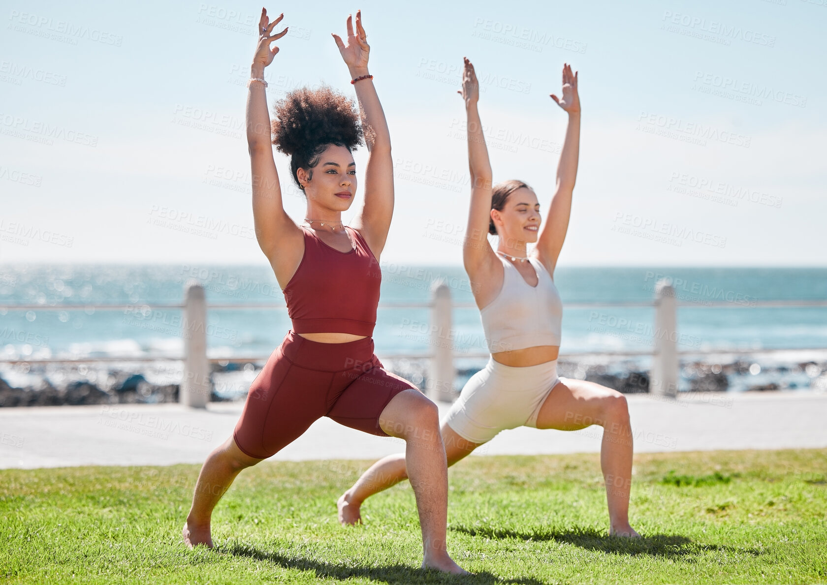 Buy stock photo Yoga, fitness and beach with woman friends outdoor together in nature for wellness training. Exercise, chakra or zen with a female yogi and friend outside for a mental health workout by the ocean