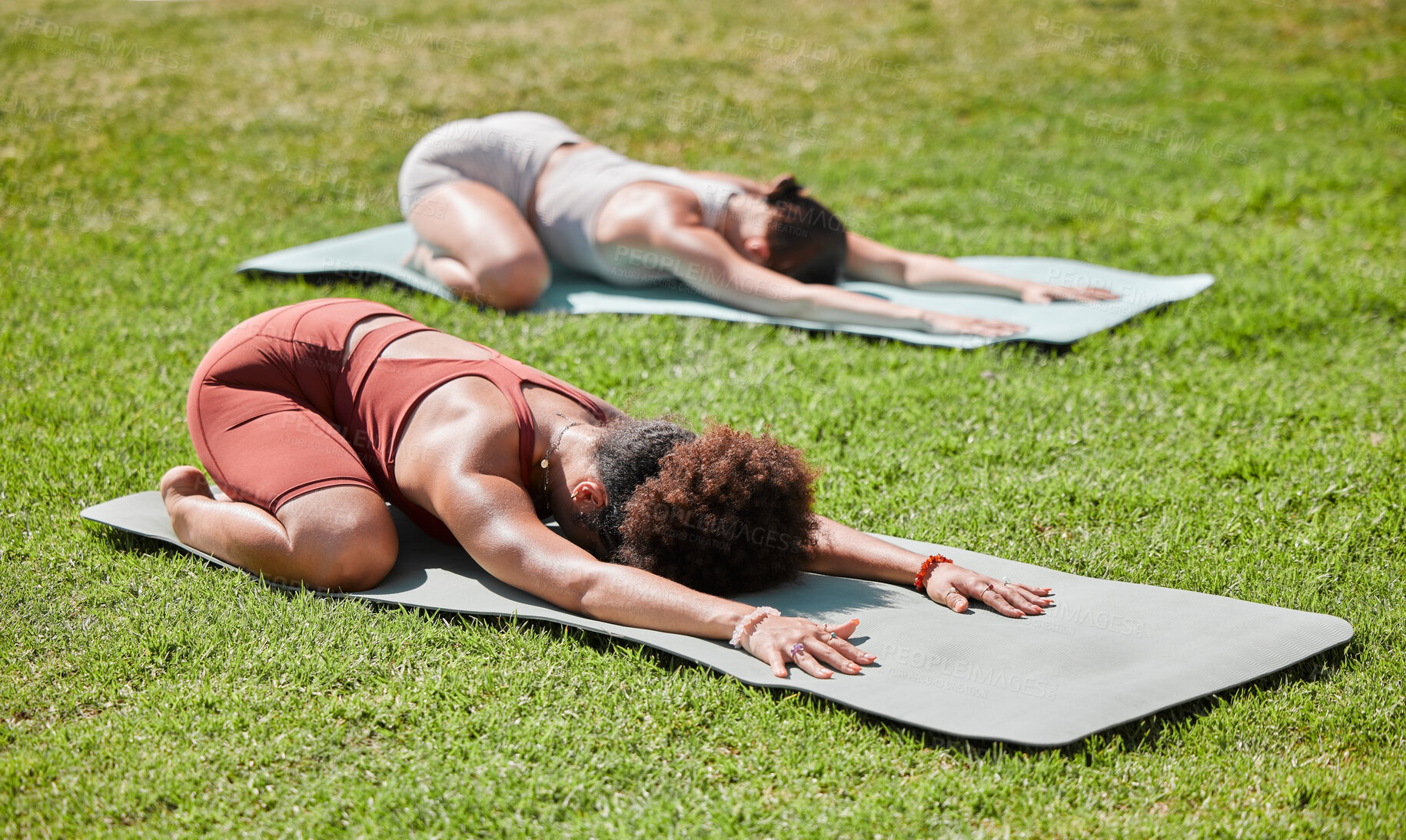 Buy stock photo Fitness, woman and yoga on grass field for spiritual wellness, healthy exercise or stretching on mat in nature. Women, friends and yogi in warm up stretch class for zen workout, relax or pilates