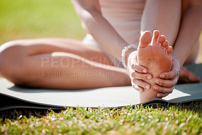 Buy stock photo Fitness, floor and woman stretching foot, feet or legs for pilates health exercise, fitness training or body healthcare. Freedom, calm peace or athlete start warm up for outdoor workout on grass lawn