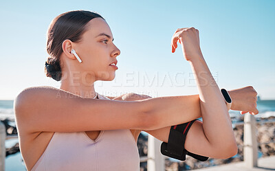 Buy stock photo Beach fitness, music and woman stretching for cardio exercise running, marathon training and listening to radio podcast. Nature freedom, calm peace and athlete warm up for outdoor performance workout