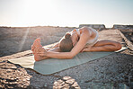Yoga, wellness and woman stretching body on rock for healthy lifestyle, pilates training and cardio workout. Sports, fitness and girl doing meditation, stretch and exercise for zen, peace and calm