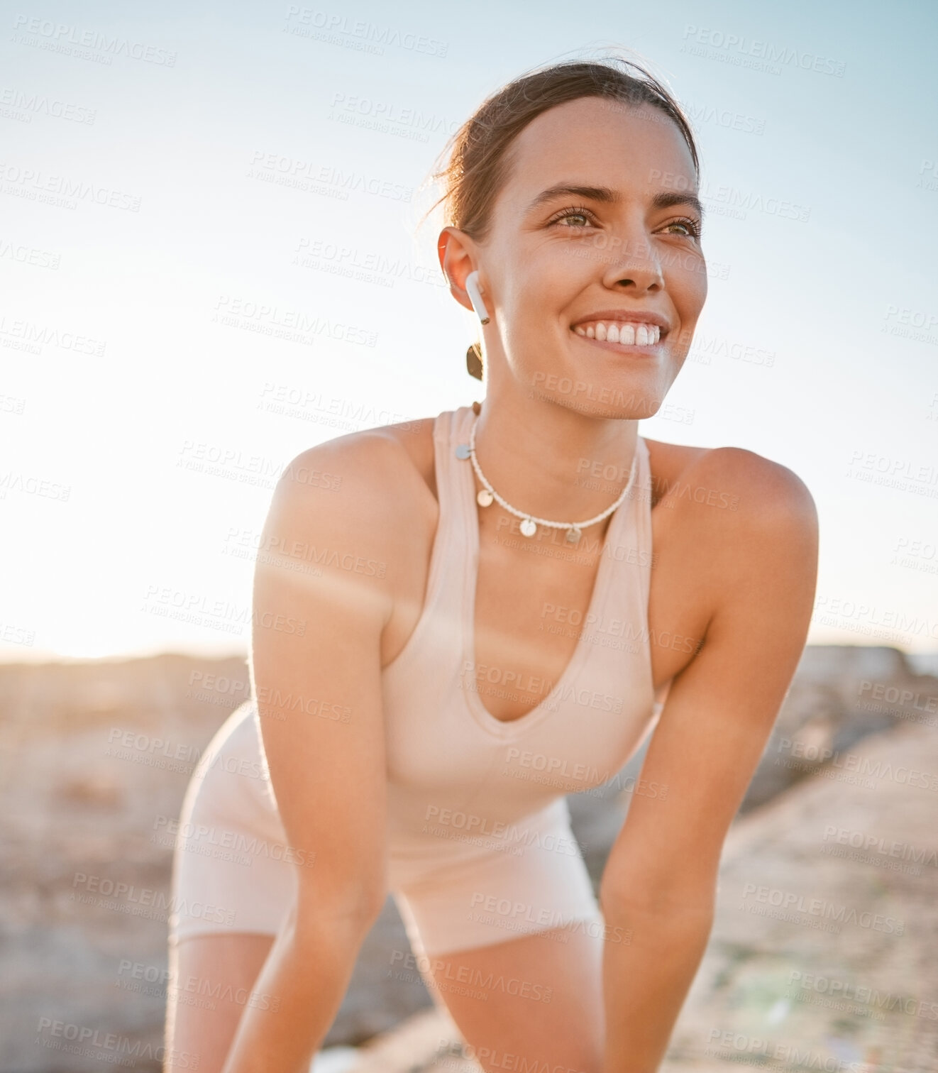 Buy stock photo Fitness break, woman and smile from running exercise, marathon training and outdoor workout. Happy face, female runner and earphones to rest with happiness, breathing and motivation of wellness goals