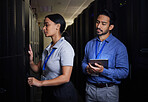 Engineer, server room teamwork and woman opening panel for maintenance or repairs at night. Cybersecurity, programmers and female with man holding tablet for software or networking at data center.