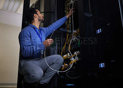 Buy stock photo Tablet, server room and engineer with connection cable for maintenance or software update at night. Cybersecurity wire, programmer and it man holding technology for database networking in data center