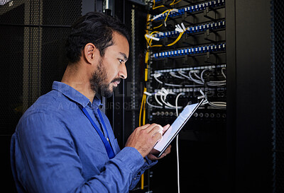 Buy stock photo Database tablet, server room and engineer man looking at research for maintenance or software update at night. Cybersecurity, it programmer or male coder with technology for networking in data center