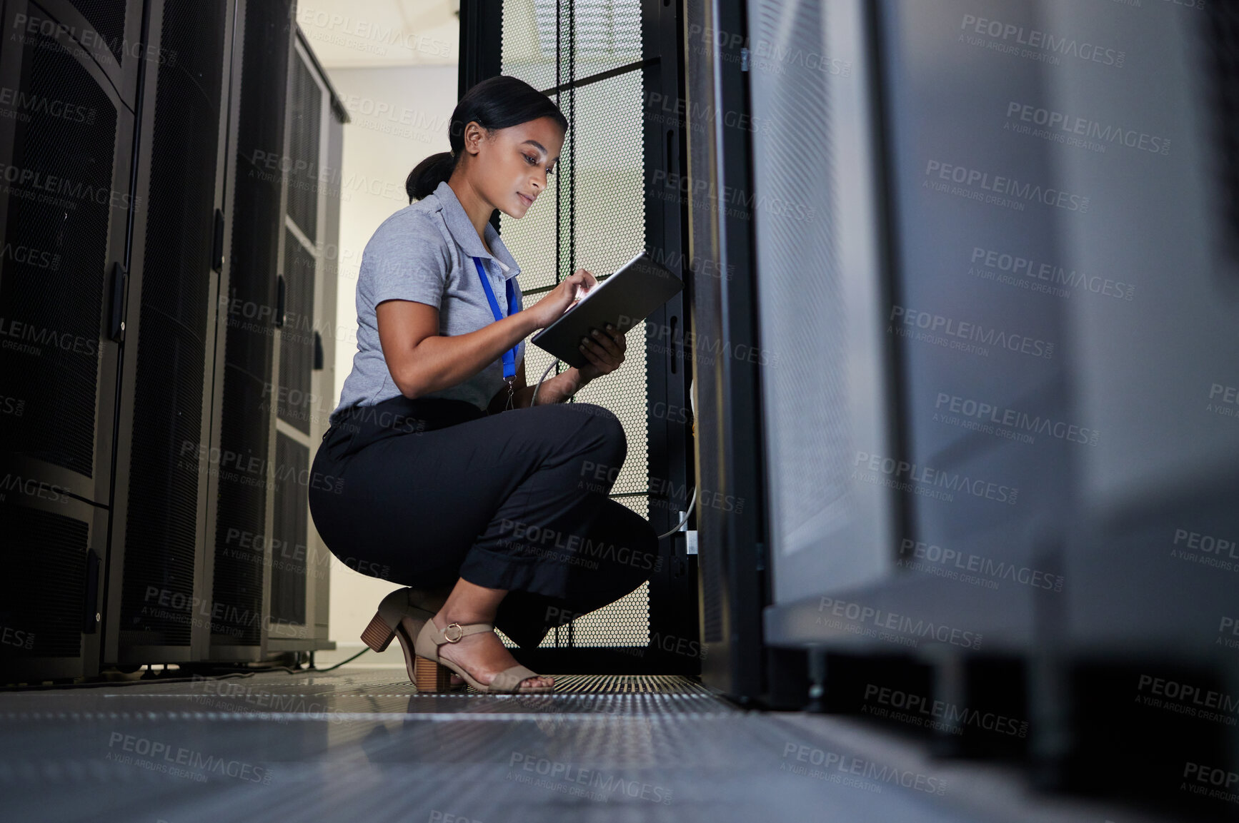 Buy stock photo Engineer, server room and woman with tablet for database connection cable, maintenance or software update at night. Cybersecurity, it and female coder with technology for networking in data center.