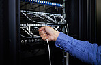 Engineer hands, server room and cable connection for software update or maintenance at night. Cybersecurity wires, cloud computing and male programmer or man check database network in data center.