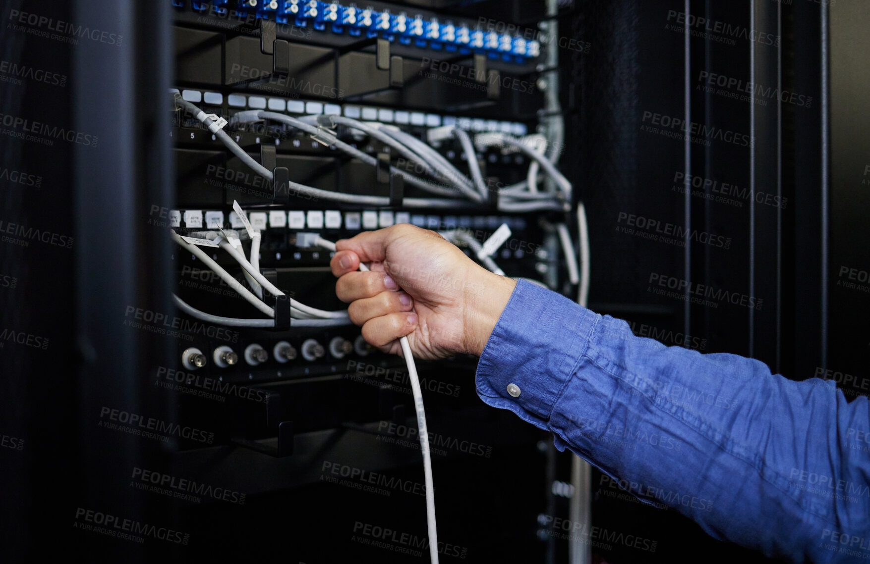 Buy stock photo Engineer hands, server room and cable connection for software update or maintenance at night. Cybersecurity wires, cloud computing and male programmer or man check database network in data center.