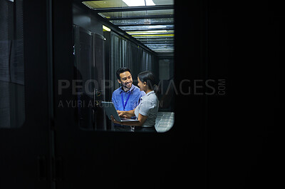 Buy stock photo Man, woman or laptop in server room, IT engineering or software programming for cybersecurity, analytics or database safety. Smile, happy or data center people on technology in teamwork collaboration