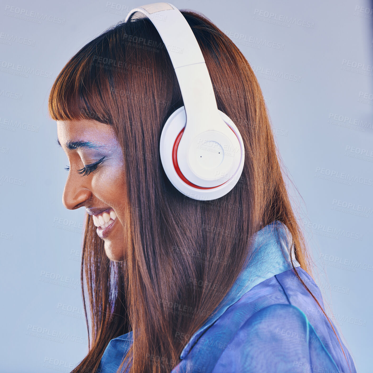 Buy stock photo Headphones, music and black woman isolated on purple background for cyberpunk fashion and creative gen z. Young person or beauty model listening on audio technology, pop art and cosmetics in studio