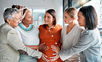 Happy, smile and pregnant woman at her baby shower with her friends to celebrate pregnancy. Happiness, excited and women supporting prenatal female with friendship on maternity leave at office party.