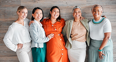 Buy stock photo Friendship, happy and portrait of a pregnant woman with females by a wood wall at her baby shower. Happiness, diversity and group of ladies supporting, loving and bonding with pregnancy together.