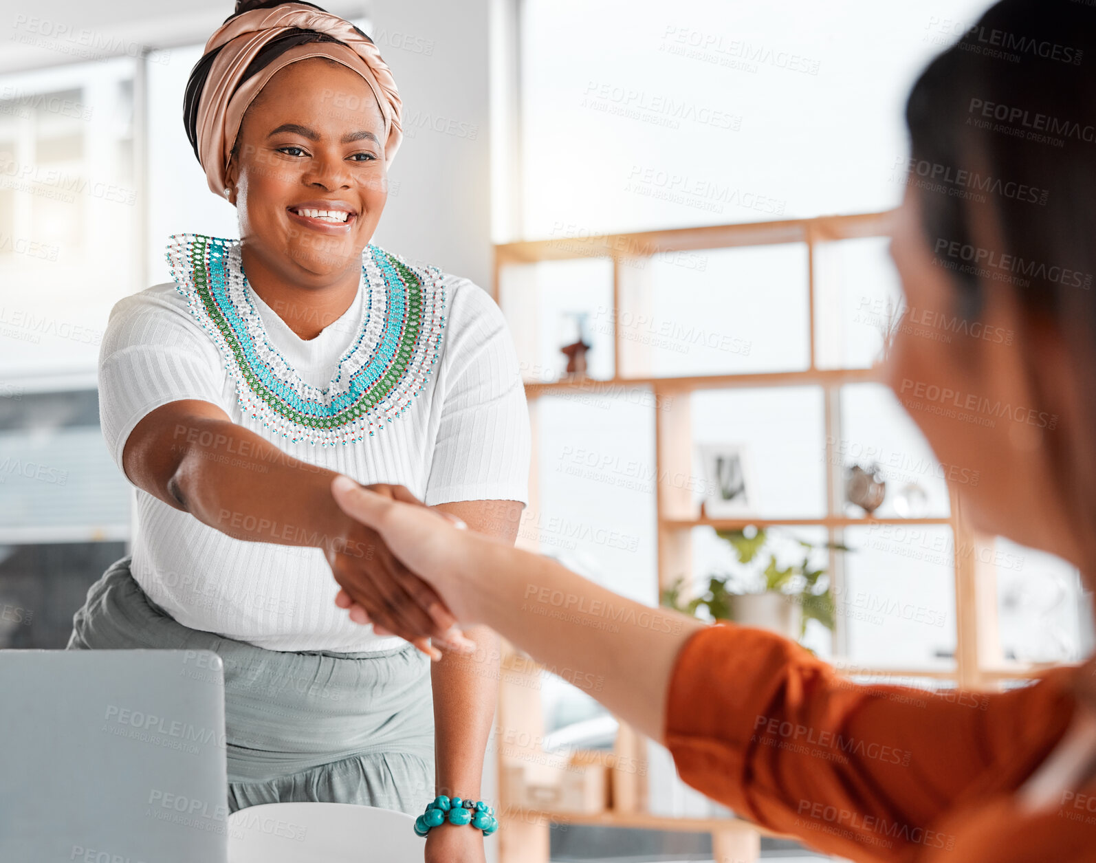 Buy stock photo Creative woman, handshake and smile for b2b, partnership or greeting in hiring at office. Happy African American female designer shaking hands of employee, colleague or intern in trust for startup