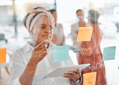 Buy stock photo Planning, thinking or black woman for brainstorming on tablet with sticky notes, planning or creative idea on glass wall. Focus, teamwork or business meeting with writing, reading or work schedule