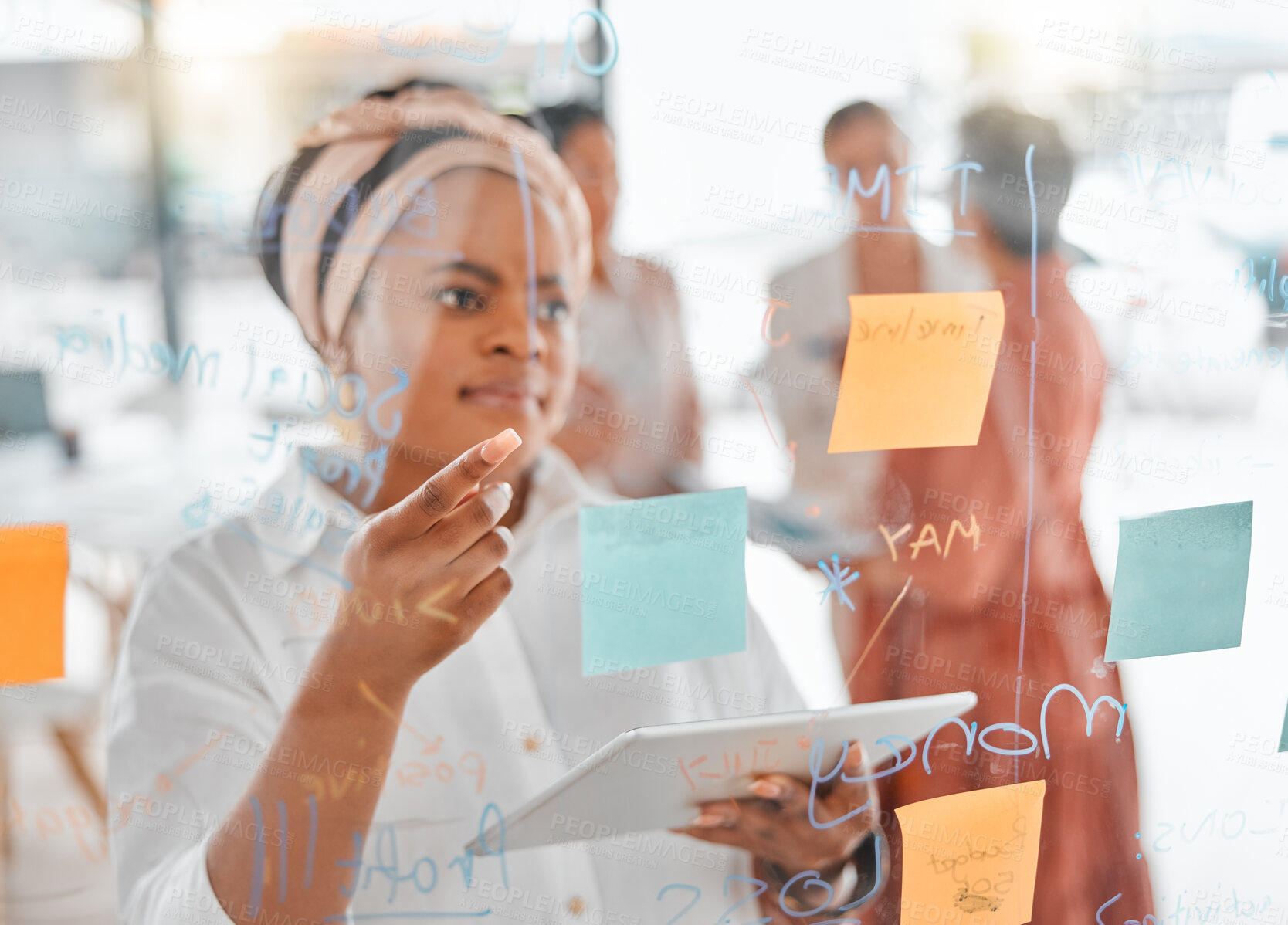 Buy stock photo Planning, thinking or black woman for brainstorming on tablet with sticky notes, planning or creative idea on glass wall. Focus, teamwork or business meeting with writing, reading or work schedule