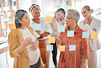 Collaboration, pregnant woman or business women planning a marketing strategy, advertising plan or branding ideas. Sticky notes, meeting or creative team writing goals for a global startup project