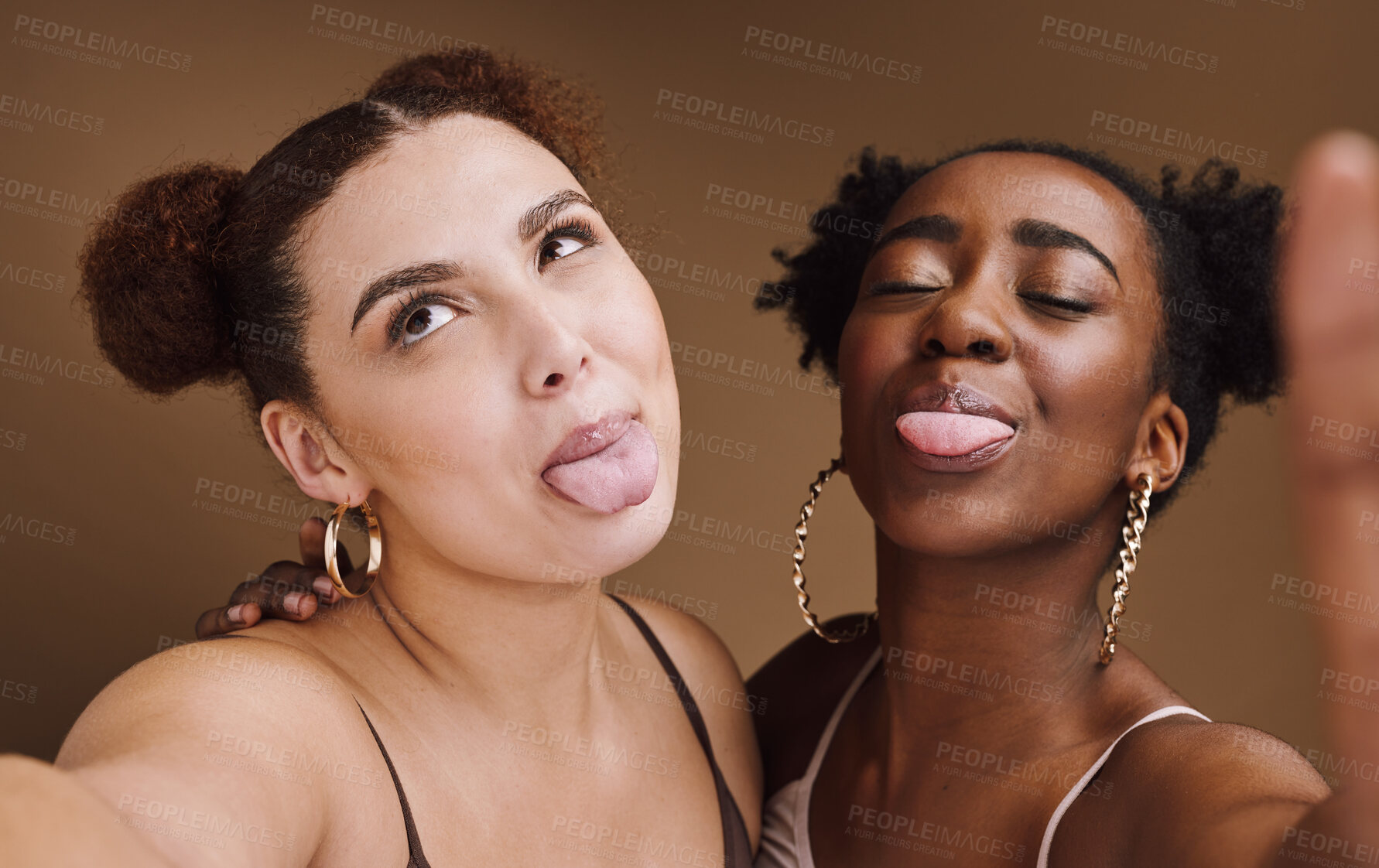 Buy stock photo Beauty, friends and tongue with selfie of black women for social media, skincare and fashion. Happy, silly and picture with funny face of girl for internet, comic and crazy in brown background studio