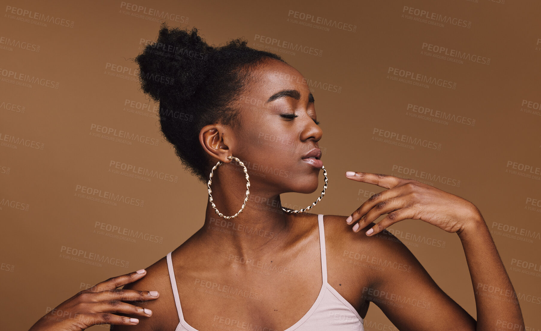 Buy stock photo Black woman, pose or fashion hairstyle on isolated brown background in relax self love, trendy or cool style promotion. Confident, hands or beauty model with makeup cosmetics, natural hair or jewelry