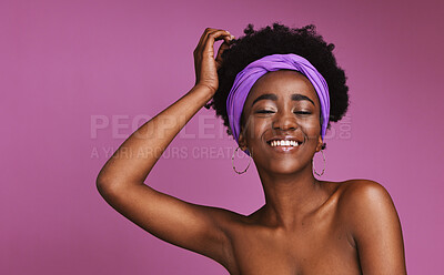 Buy stock photo Portrait, beauty and mockup with a model black woman on a purple background in studio for natural skincare. Face, hair and headband with a young afro female posing to promote cosmetic treatment