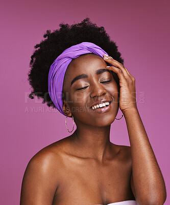 Buy stock photo Face, beauty and skincare with a model black woman on a pink background in studio for natural care. Facial, hair and headband with an attractive young female posing to promote cosmetic treatment