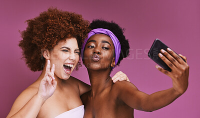 Buy stock photo Phone, skincare and friends with peace sign for selfie on purple background for wellness, fashion and cosmetics. Beauty, makeup and happy women on smartphone for social media, picture and online post