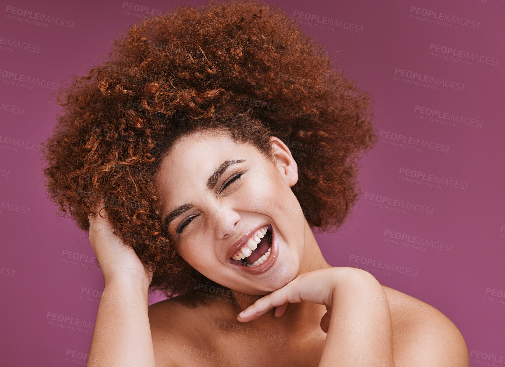 Buy stock photo Happy woman, portrait and afro hairstyle on isolated purple background in comic emoji, laughing or silly facial expression. Beauty model, funny face or natural hair growth on skincare studio backdrop