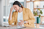 Office, headache and pregnancy, woman at desk with hand on stomach, exhausted in call center with headset. Burnout, pain and pregnant telemarketing consultant with anxiety from deadline time stress.