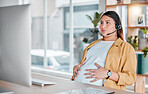 Office, pregnancy and woman doing breathing exercise and hands on stomach in call center with headset. Burnout, pain and pregnant telemarketing consultant holding belly while working on computer.