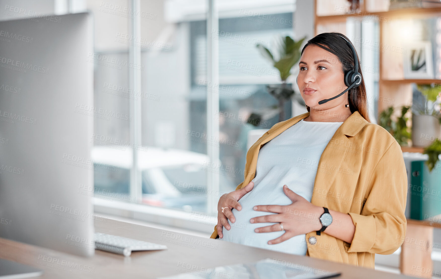 Buy stock photo Office, pregnancy and woman doing breathing exercise and hands on stomach in call center with headset. Burnout, pain and pregnant telemarketing consultant holding belly while working on computer.