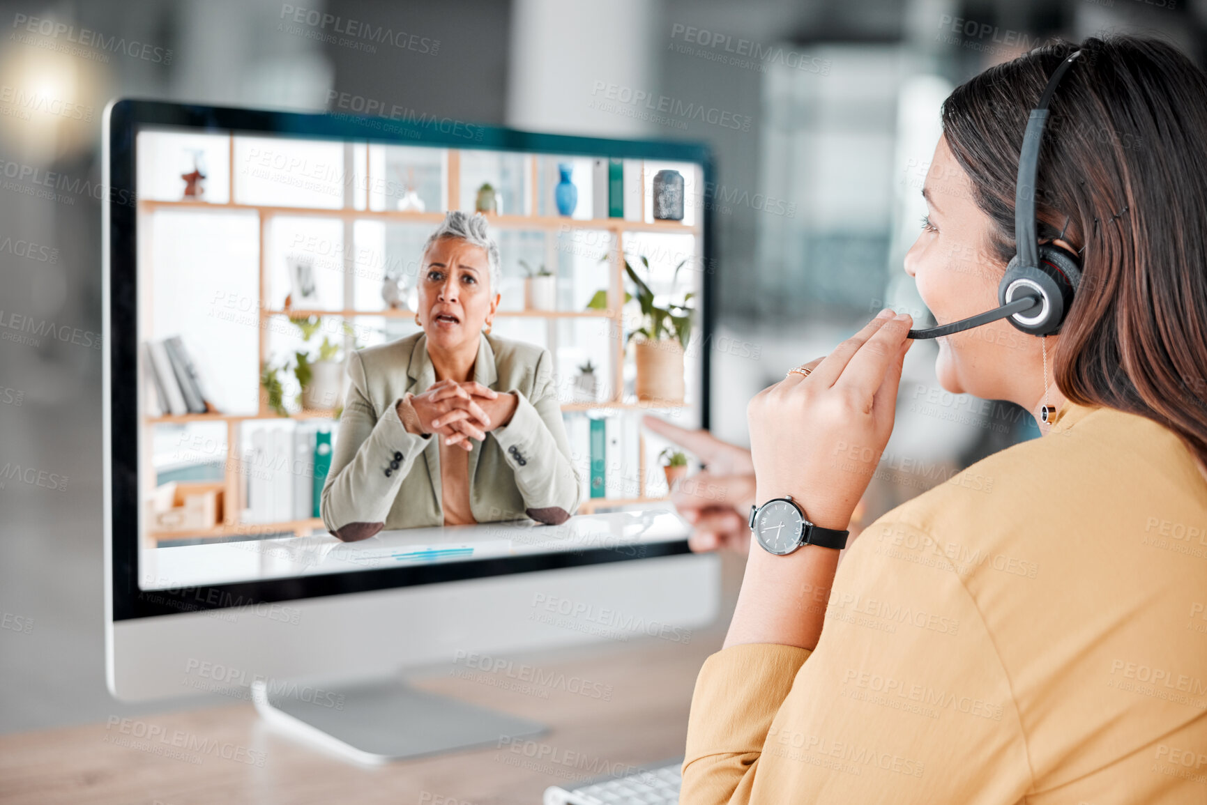 Buy stock photo Customer service, computer video chat and woman in call center pointing at shocked client. Telemarketing, virtual conference and female sales agent, consultant or worker in online meeting in office.