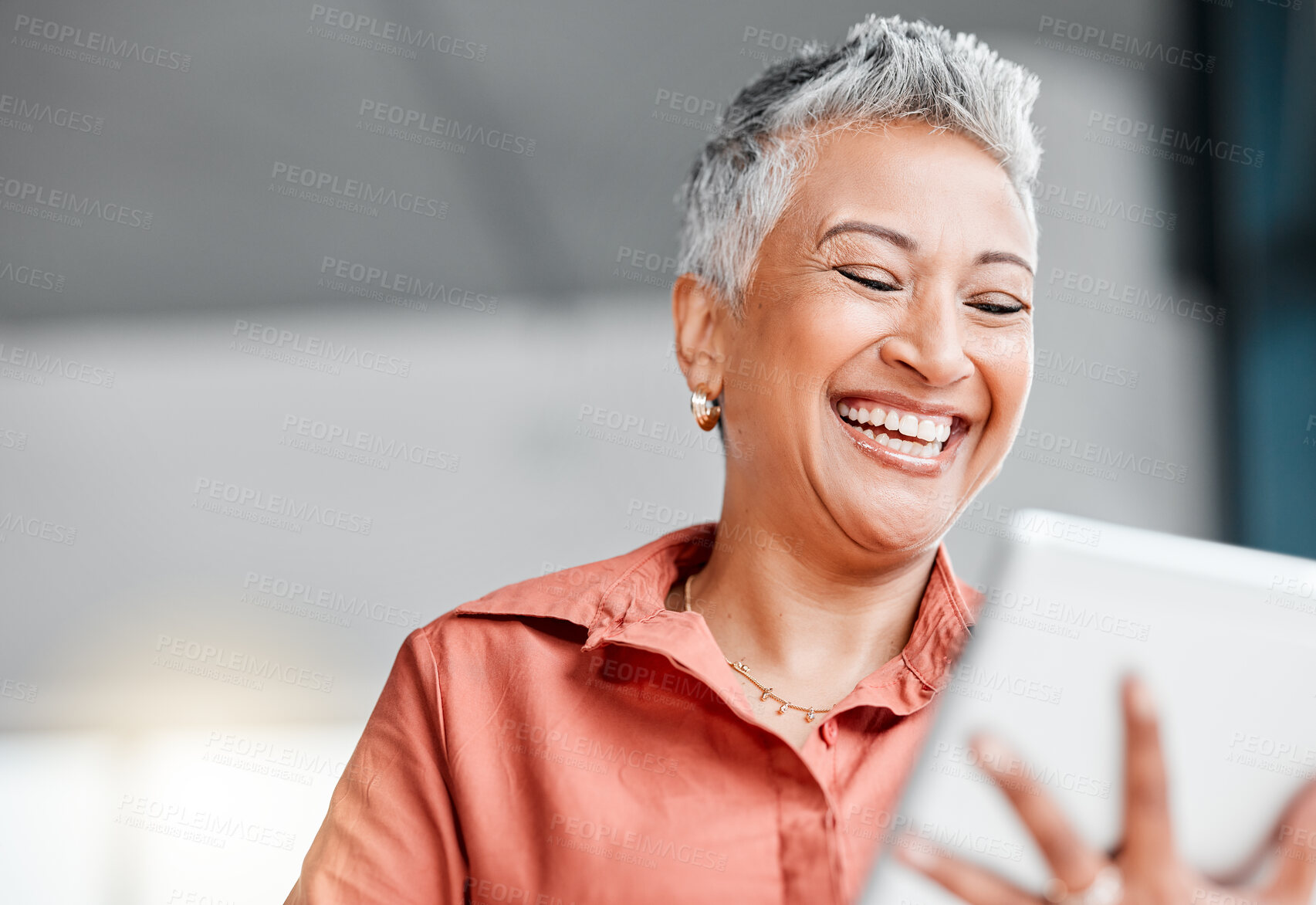 Buy stock photo Tablet, senior and business woman laughing in office at comic meme or joke on social media. Technology, funny comedy and happy elderly female with touchscreen for web scrolling or internet browsing.