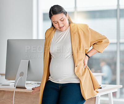 Buy stock photo Pregnant woman, office and tired with back pain, burnout and relax by desk for wellness break. Startup, corporate executive and pregnancy with muscle stress, overworked or anxiety for body healthcare