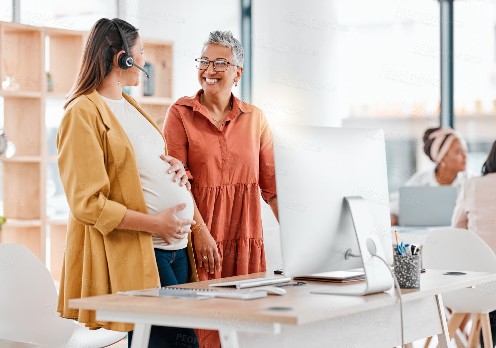 Buy stock photo Call center, pregnant and teamwork of women in office or workplace for customer service. Pregnancy, telemarketing and collaboration of happy manager talking with employee, consultant or sales agent.