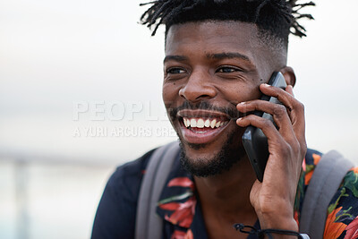 Buy stock photo Phone call, happy and black man with a cellphone for communication in the city while on an adventure. Happiness, smile and African male on a mobile conversation with smartphone in town on a holiday.