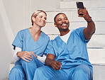 Healthcare, doctors and selfie in hospital, smile and fun together, bonding or achievement. Medical professionals, woman or black man with smartphone, picture for memories or in clinic with happiness
