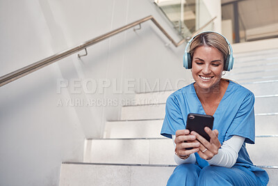 Buy stock photo Doctor, phone and stairs for consultation, communication or video call outside hospital for health advice. Happy woman nurse smiling in healthcare with smartphone and headset for telemedicine