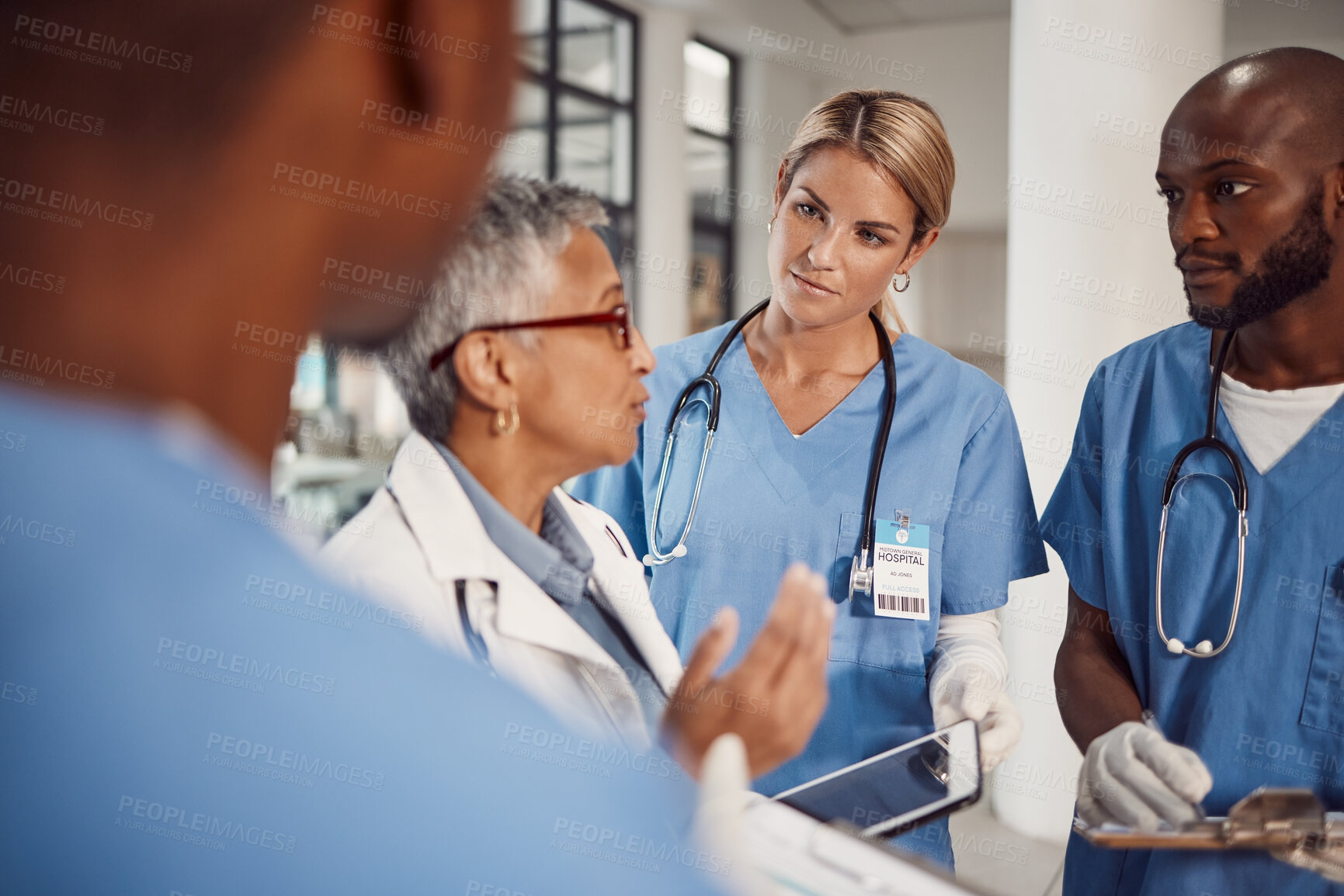 Buy stock photo Group of doctors, planning management in hospital and workflow of medical student with training manager on tablet. Nurses, professional healthcare people and technology for surgery problem solving