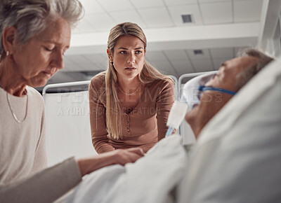 Buy stock photo Sick, senior and family with a man in hospital for medical support with sad and worried people. Healthcare, ill and woman and daughter with an elderly patient after an accident, injury or dying