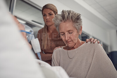 Buy stock photo Sad woman visit her sick husband in hospital with the support and comfort from their daughter. Healthcare, love and senior female sitting and praying with her ill man with cancer in a medical clinic.