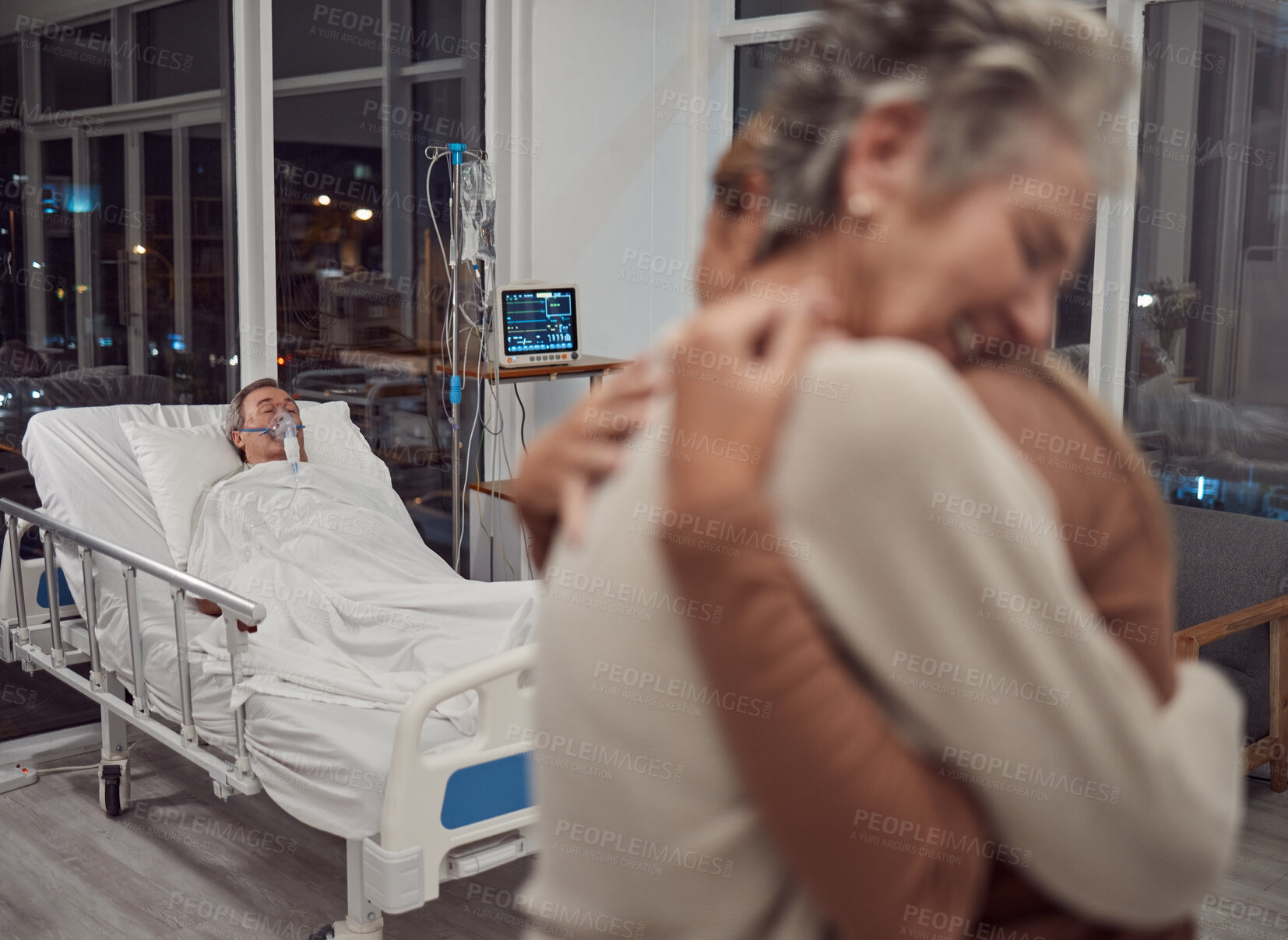 Buy stock photo Hug, support and family at hospital with father lying in bed sick with cancer or illness. Sad, comfort and senior woman and girl hugging, embrace or cuddle for empathy, love and hope for life of man.