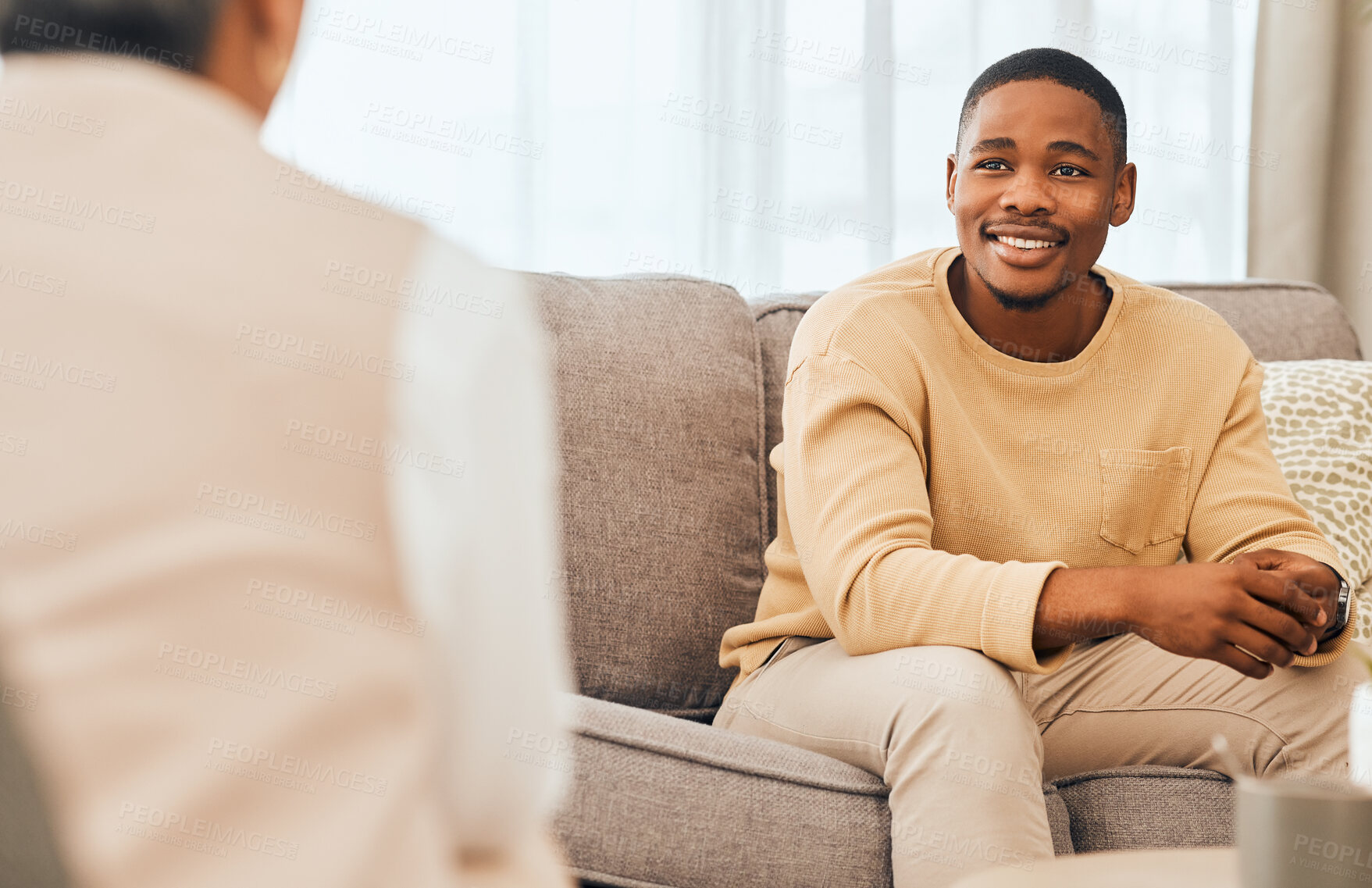 Buy stock photo Black man, counseling and psychology consulting for therapy, mental healthcare or support. Happy patient talking to psychologist, therapist and medical help in consultation, advice and wellness check