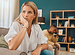 Divorce, affair and interracial couple angry in lounge, upset or disagreement with affair, separation or dishonest. Anger, black man or woman in living room, mental health or annoyed with frustration