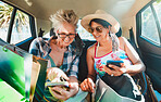 Travel, phone and senior women in car for gps mobile app on retirement holiday, vacation and journey. Adventure, road trip and happy elderly friends in motor vehicle with smartphone for social media